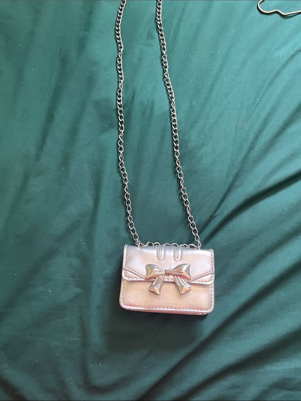 Sliver purse with bow